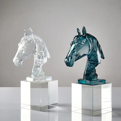 Two glass horse head crystal statues in clear and teal blue on transparent pedestals for living room decorbites decor