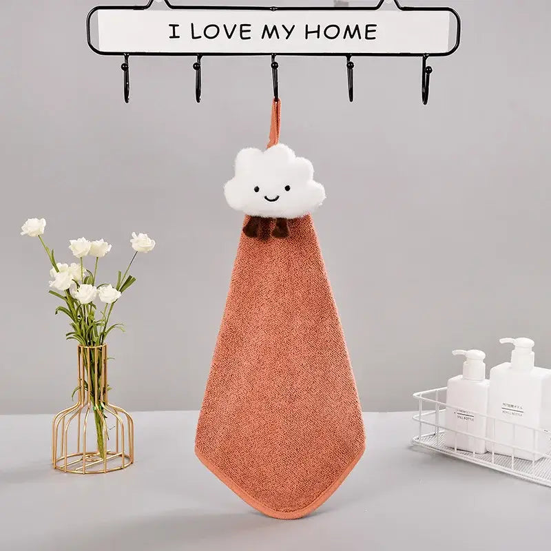 Cute orange terrycloth hand towel with white cloud charm and brown bow for decorbites cloudy day hand set