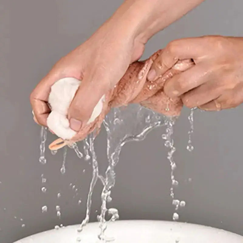 White soft textured sponge with rubbery grip and elastic band for easy handling in decorbites cloudy day hand towel set