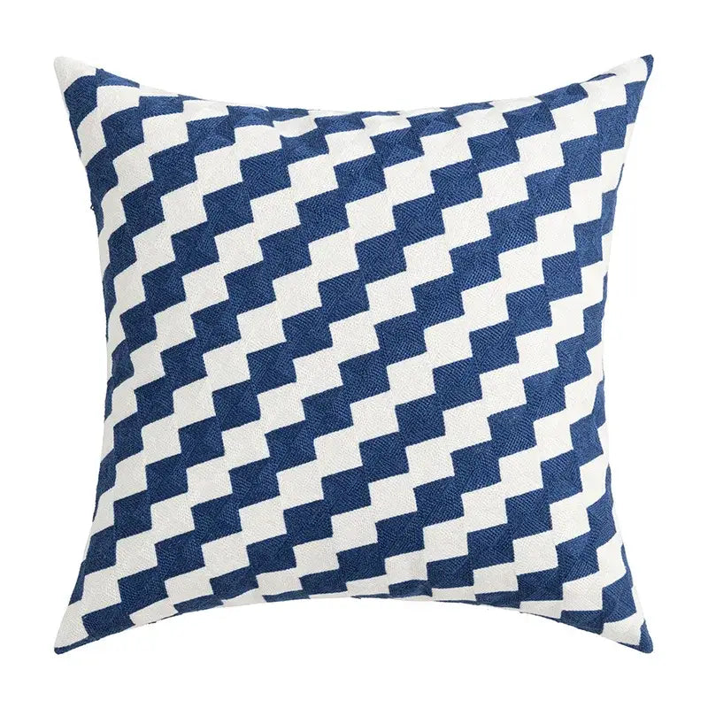 Square throw pillow with bold navy blue and white houndstooth pattern cushion cover in decorbites coastal chic style