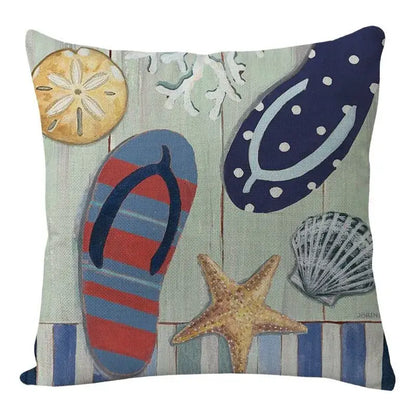 Beach-themed decorbites coastal cushion cover featuring flip-flops starfish seashells on textured fabric in teal and blue