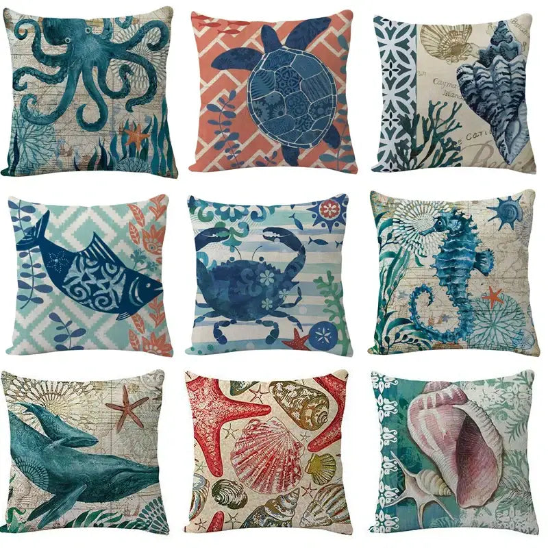 Set of nine decorbites coastal cushion covers with ocean-themed designs in teal and blue for living room decor