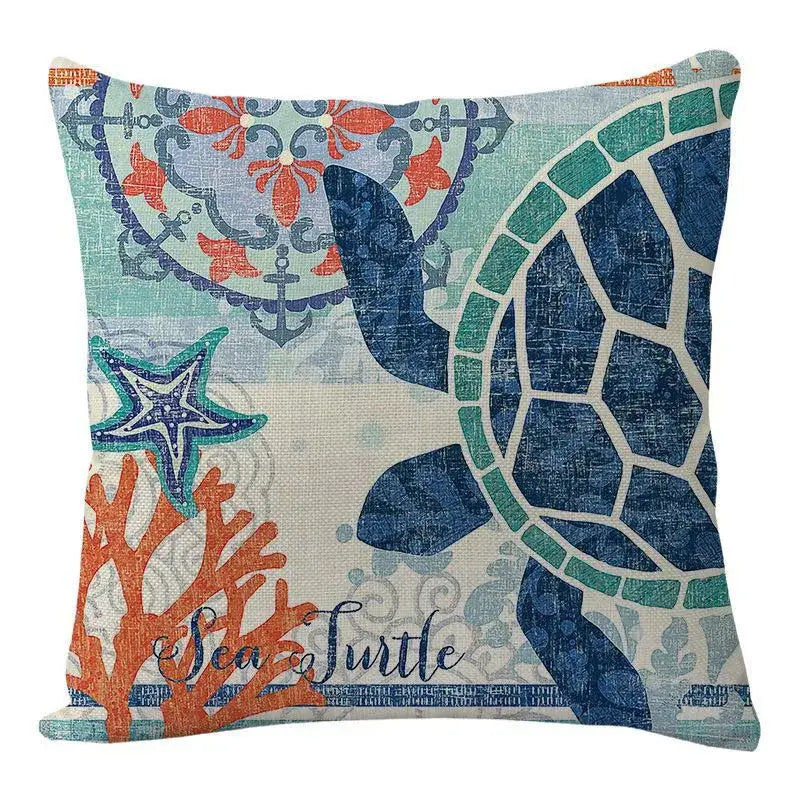 Coastalcushion cover featuring a navy blue sea turtle and coral motifs on textured beige fabric for decorbites coastal decor