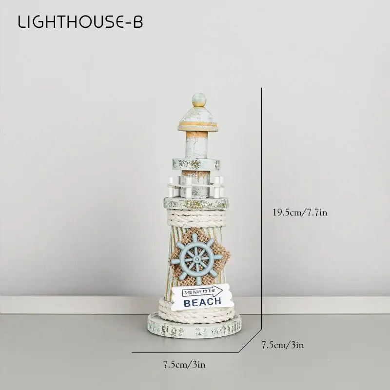 Coastal white and gray wooden ship model decor with a rustic beige lighthouse and nautical rope base for living room display