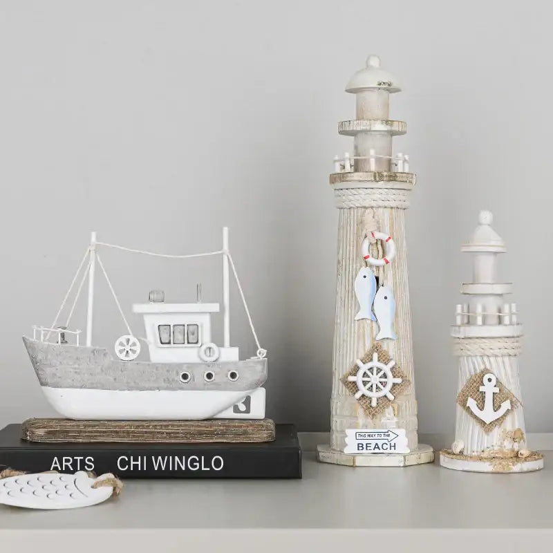 Weathered white and gray coastal wooden lighthouse decor with nautical details and this way to the beach sign for living room