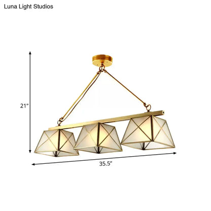 Decorbites colonial style pendant light with tapered island design features gold-toned brass and three triangular glass shades