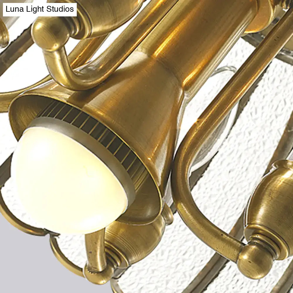 Brass-finished decorbites™ colonial style pendant ceiling light with bubble glass bulbs and scallop accented arms