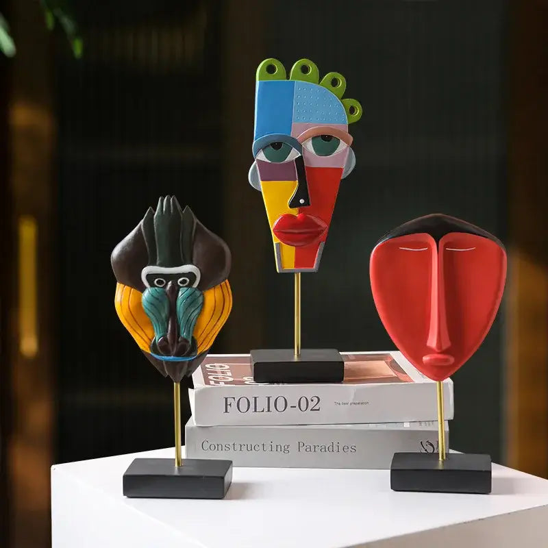 Three colorful african abstract face monkey sculptures with bold geometric patterns for living room decorbites decor