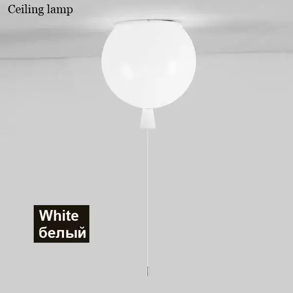 White spherical ceiling light with minimalist design and thin pull cord for decorbites colorful balloon ceiling decor