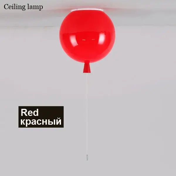 A glossy red balloon ceiling sconce lamp with a sleek rounded design and tapered base for bedroom decor