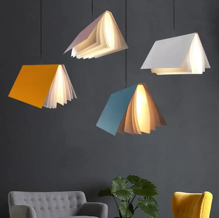 Colorful book pendant lamp with layered paper pages and warm interior lighting for living room decorbites pendant lamp
