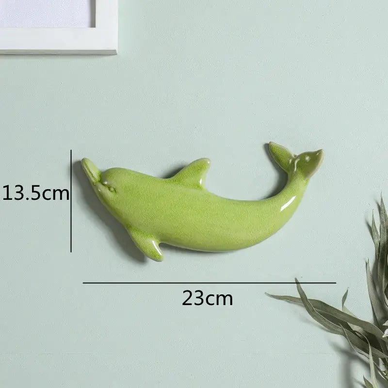 Glossy lime green ceramic dolphin fish wall decoration 23cm long smooth curves modern decorbites dolphin fish ocean design