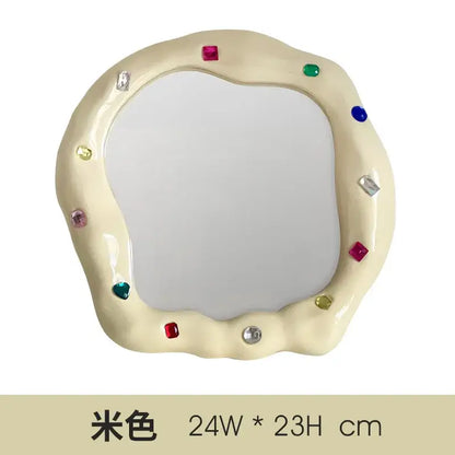 Cream ceramic makeup mirror with irregular edge and colorful square and round gemstones for bedroom use
