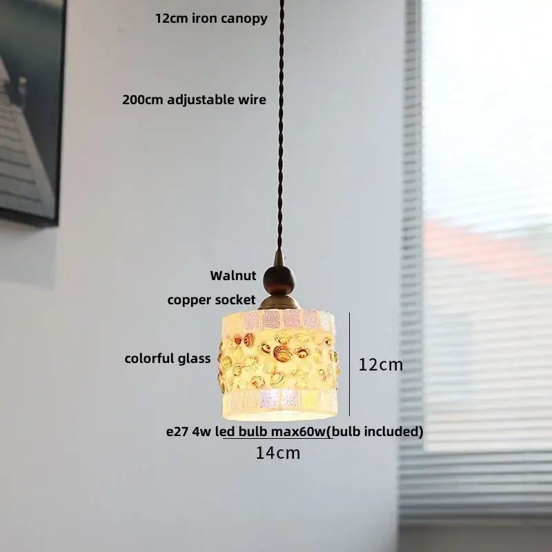 A 12cm tall colorful glass shell led pendant lamp with seashell patterns, walnut socket, and adjustable copper wire for dining decorbites colorful glass lighting