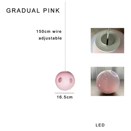 A sleek 16.5cm diameter colorful glaze glass pendant light with soft pink gradient and adjustable led wire suspension