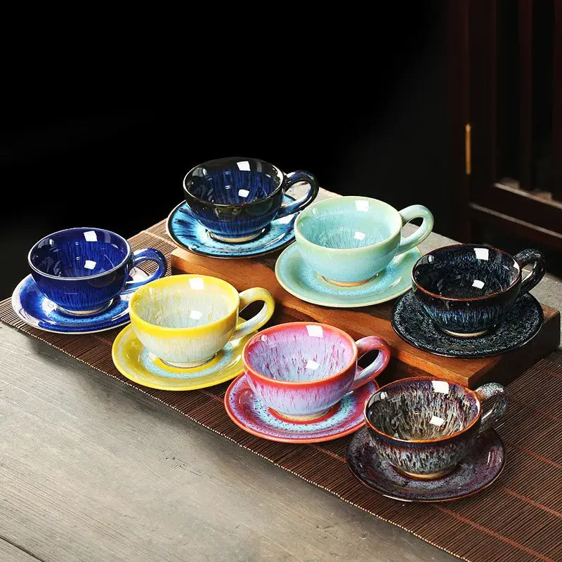 Set of six colorful glazed porcelain tea cups with matching saucers in vibrant hues for dining room decor