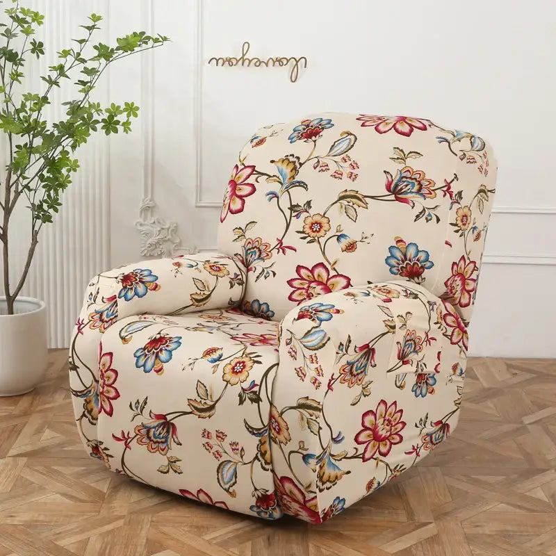 Cream-colored floral stretch sofa cover with vibrant red blue and yellow blossoms on soft elastic fabric protector