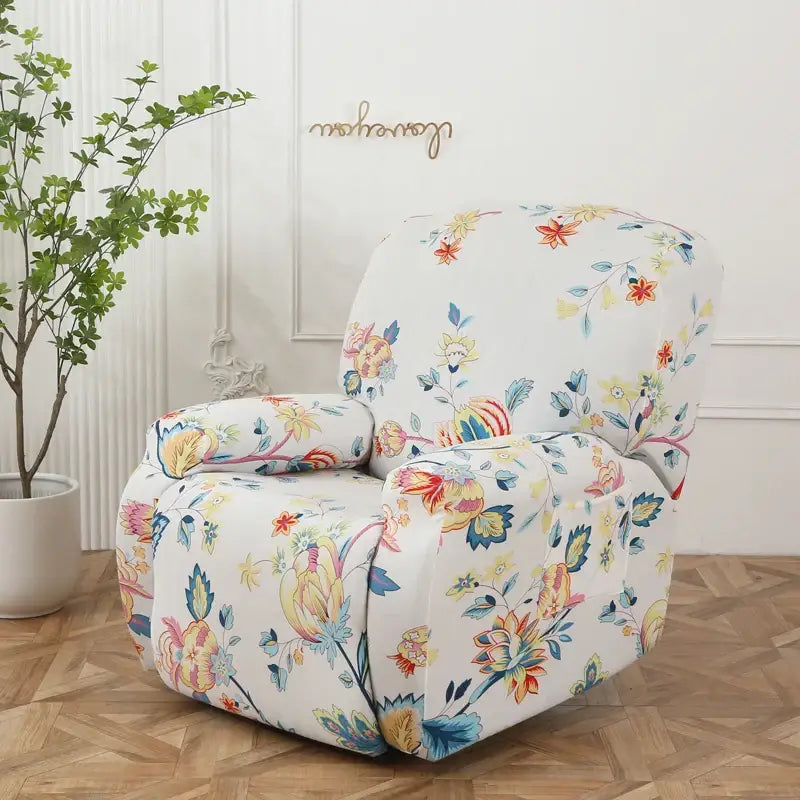 White recliner chair with colorful patchwork elastic sofa cover featuring vibrant floral patterns for living room protection