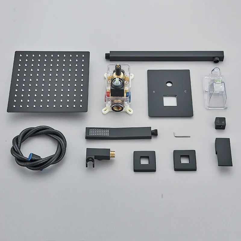 Black matte concealed shower system with square rainhead handheld sprayer and chrome accents for rainfall waterfall effect