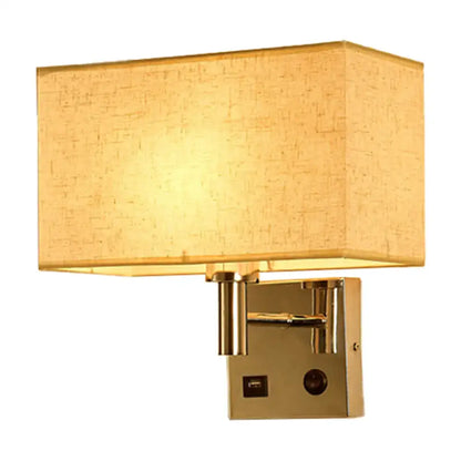Contemporary wall lamp with gold finish, beige textured fabric shade, wall mounted with integrated usb port
