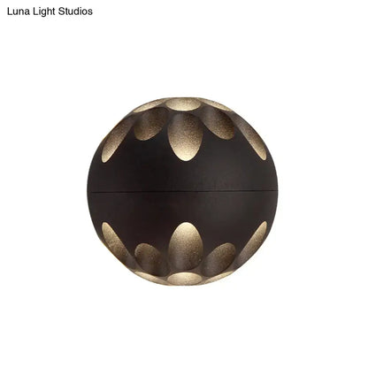 Contemporary black and gold spherical led wall lamp with petal-shaped cutouts for bedroom wall light use