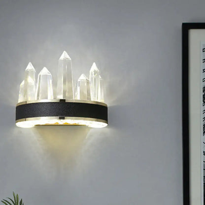 Contemporary black and gold crystal-tipped wall mount lighting with a sleek leather-wrapped base for living room use