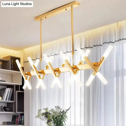 Gold finish modern DecorBites island pendant light with intersecting x-shaped arms and frosted glass fixtures