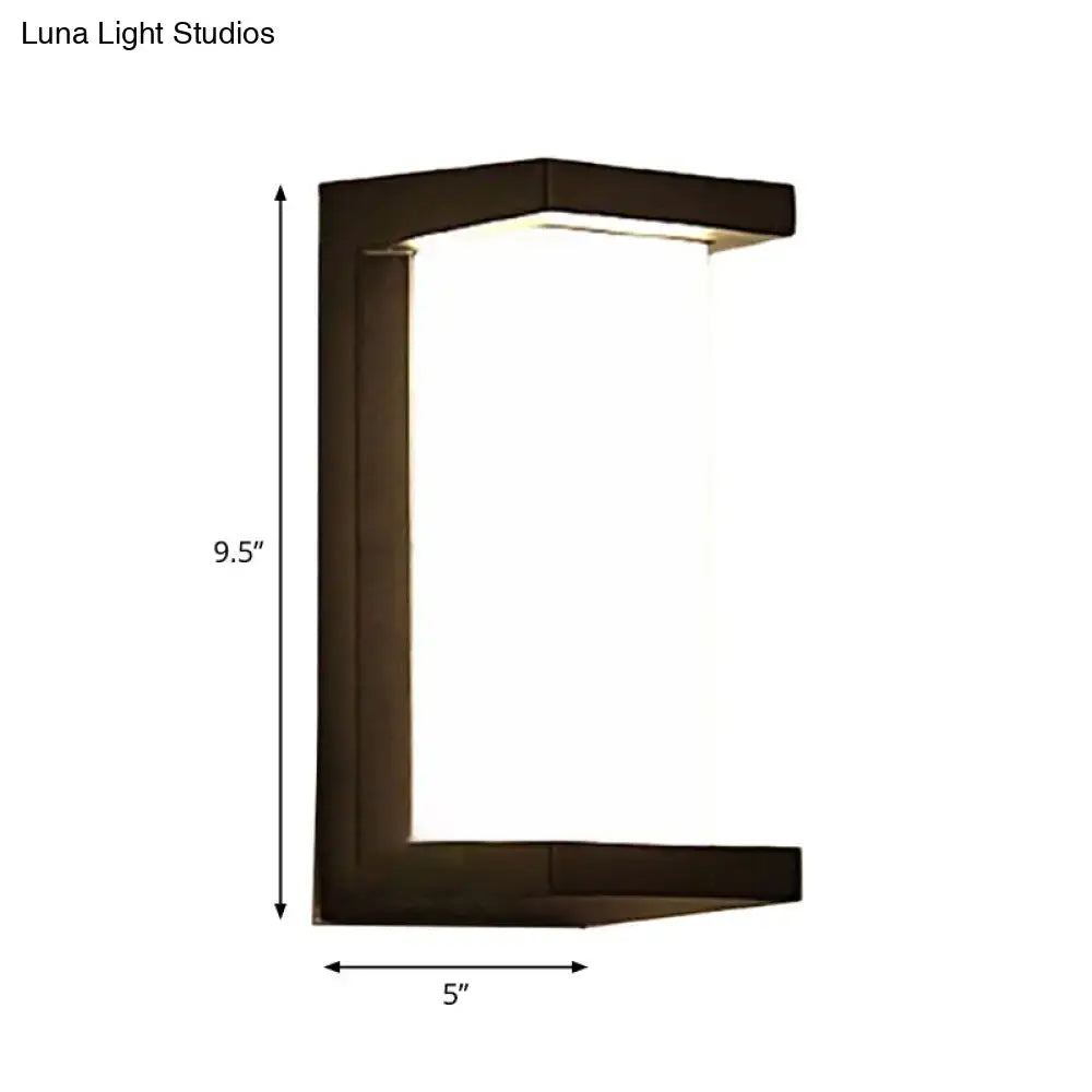 Contemporary dark bronze wall lamp with rectangular angular frame and frosted glass panel for outdoor use