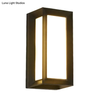 Contemporary black led wall lamp with dark bronze metal frame and warm diffused light for courtyard use