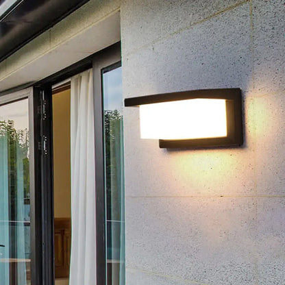 Contemporary black led wall lamp with minimalist rectangular design and warm white outdoor illumination
