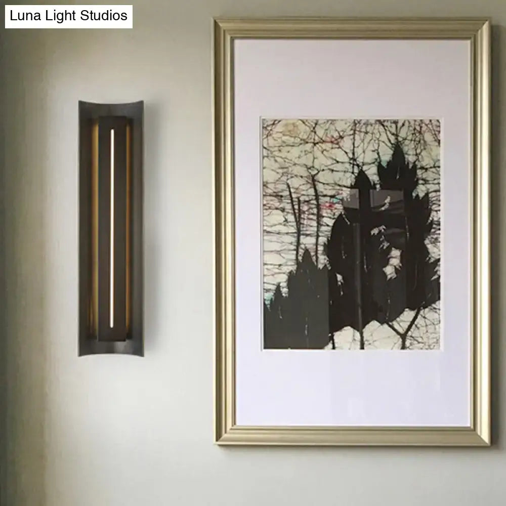 Contemporary black led wall lamp with metal shade and sleek dark bronze finish featuring two vertical led light strips