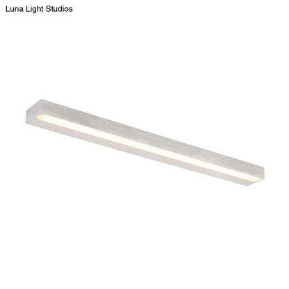 Modern white warm rectangular linear vanity sconce with sleek minimalist design for contemporary bathroom lighting