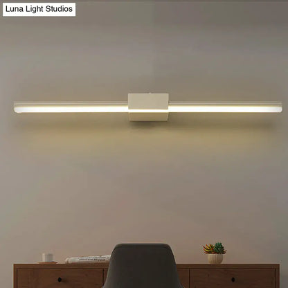Contemporary black and white wall light with sleek rectangular design and central mounting bracket for fixture width alignment