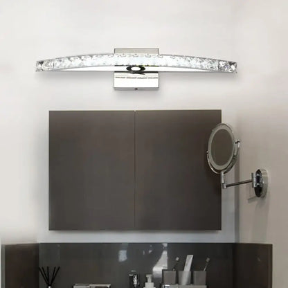 Contemporary bow shaped silver vanity lighting wall sconce with sleek chrome finish and embedded crystal accents