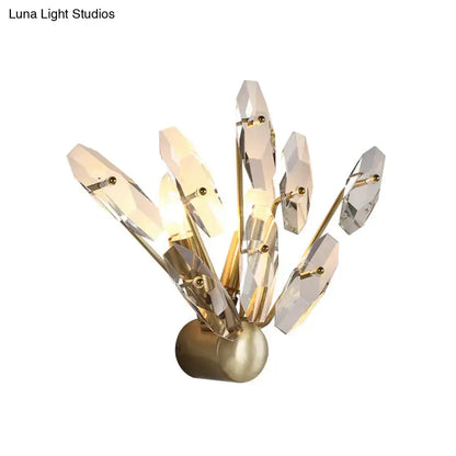 Contemporary brass crystal sputnik wall sconce with gold finish and faceted prisms for elegant living room wall light