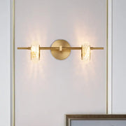 Contemporary brass double oval light fixture with textured glass shades and circular mounting plate for 220v-240v use