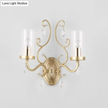 Contemporary gold clear glass wall light with ornate crystal droplets for elegant bedroom wall sconce lighting