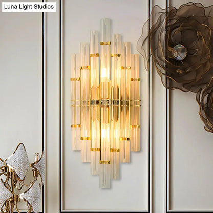 Contemporary gold finish crystal tube wall sconce with vertical frosted glass tubes and gold-toned metal accents