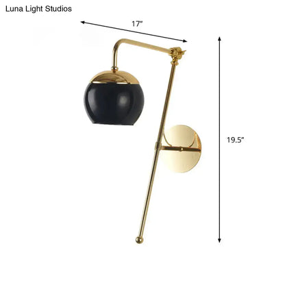 Contemporary gold gooseneck sconce light with a sleek brass wall mount lamp and black clear spherical shade