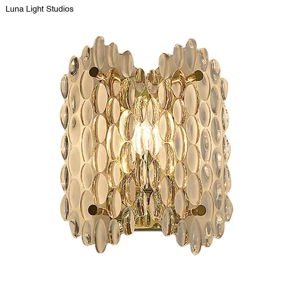 Contemporary gold wall light with clear crystal bubble textured glass design for elegant hallway illumination