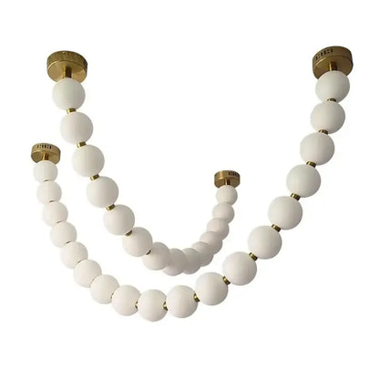 Contemporary led pendant chandelier featuring a white matte glass orb with gold-toned metal fixtures for dining room decorbites contemporary led
