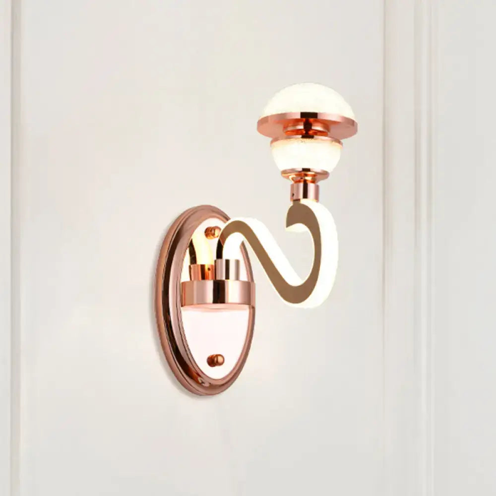 Contemporary rose gold metal urn wall lamp with curved sculpted arm and frosted glass globe shades for bedroom lighting