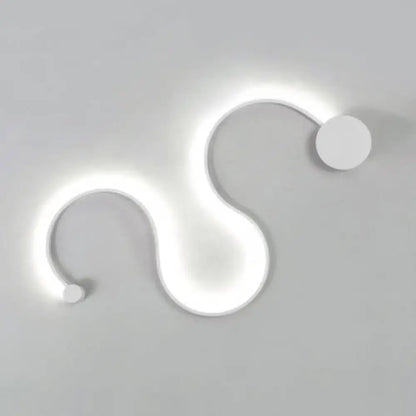 Modern white s-shaped wall sconce with sleek minimalist design offering contemporary twist and white warm bedroom light
