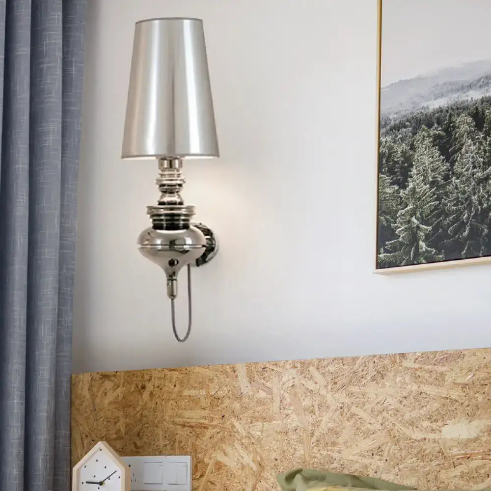 Contemporary silver-toned wall light with conical shade and ornate base compatible with e26 e27 bulb base