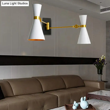 Contemporary white and gold wall sconce with adjustable arm and matte finish for directional bedroom lighting