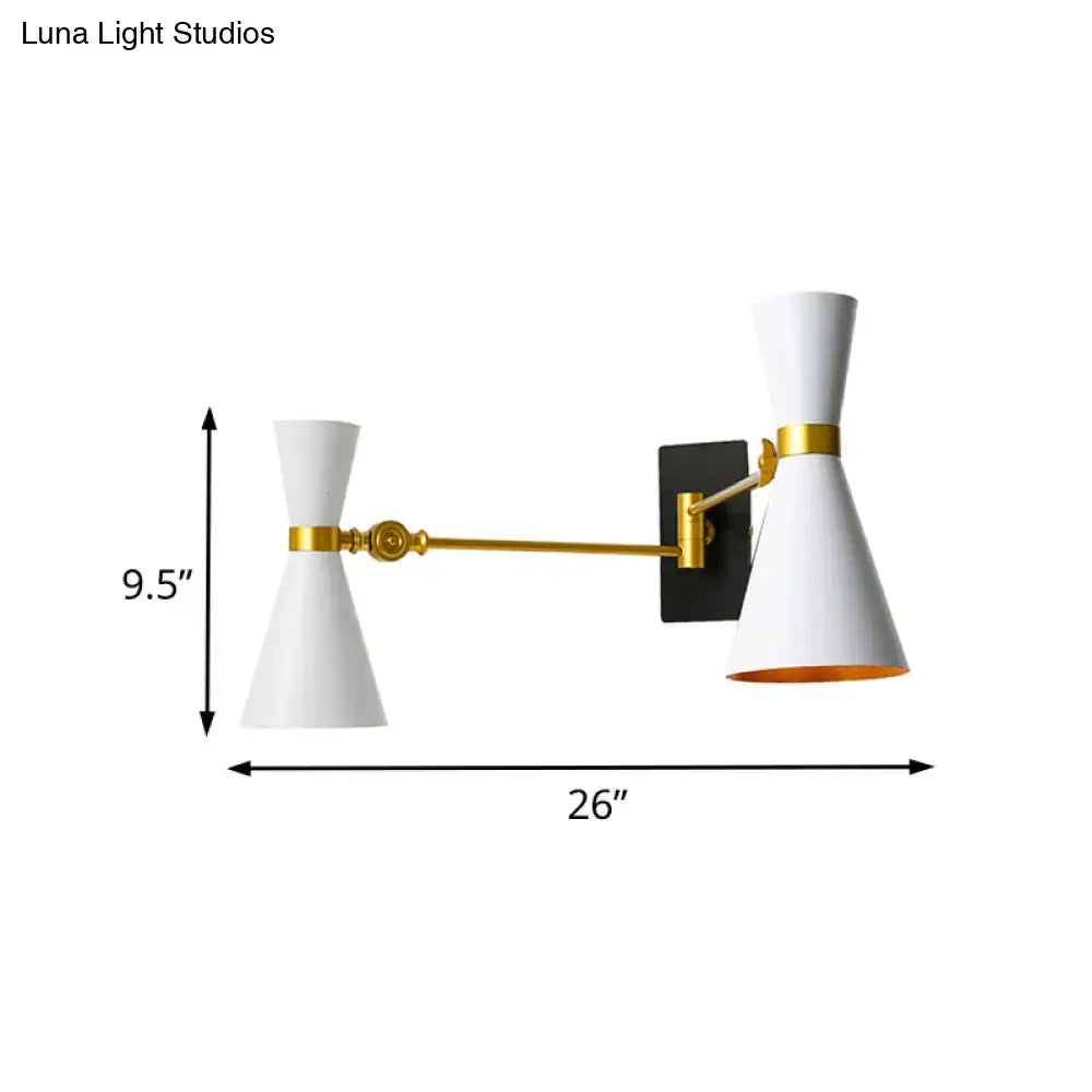 Contemporary white and gold wall sconce with adjustable arm and black mounting plate for bedroom lighting