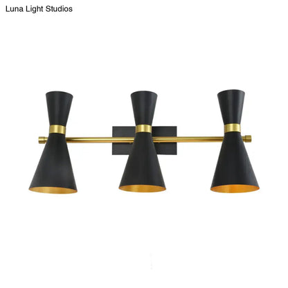 Contemporary black and gold three-light wall sconce with conical shades and adjustable arm for bedroom lighting