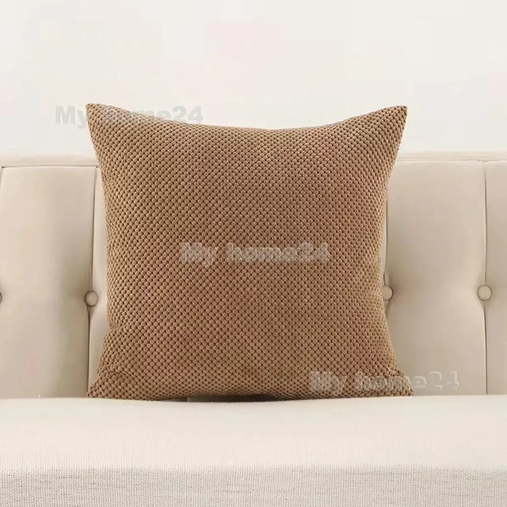 A tan-colored square corduroy corn kernel throw pillowcase with textured woven fabric for living room sofa decorbites decor