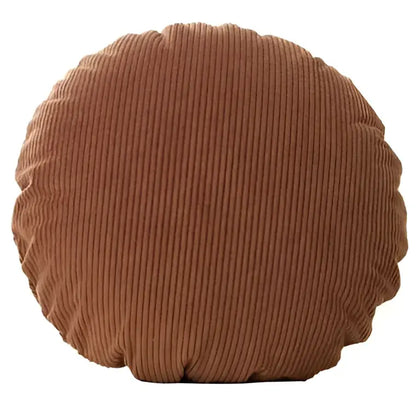 A round plush brown corduroy round pillow cover with soft textured surface for living room decorbites decor