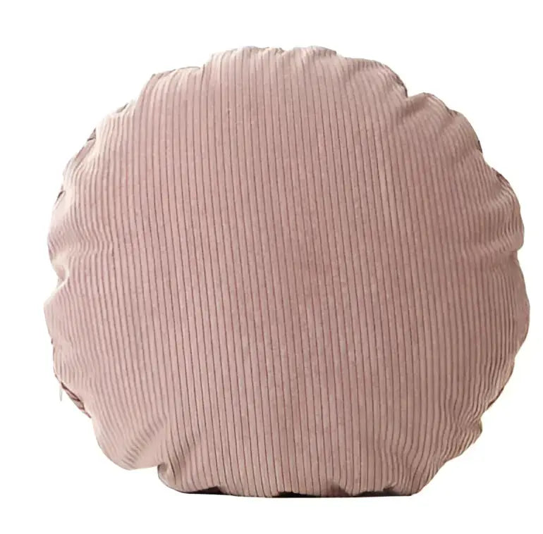 A soft dusty rose decorbites corduroy round pillow cover with plush texture for living room decor